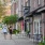 Exterior building with people walking down sidewalk