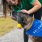 woman with dog wearing bandana