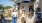 women holding drinks in front of a local eatery