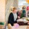 woman buys clothing at local botique