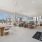 expansive outdoor lounge with sitting and dining areas