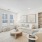 Living room with couch and chair and large window