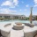 Outdoor Fire Pit with Seating Next to Pool
